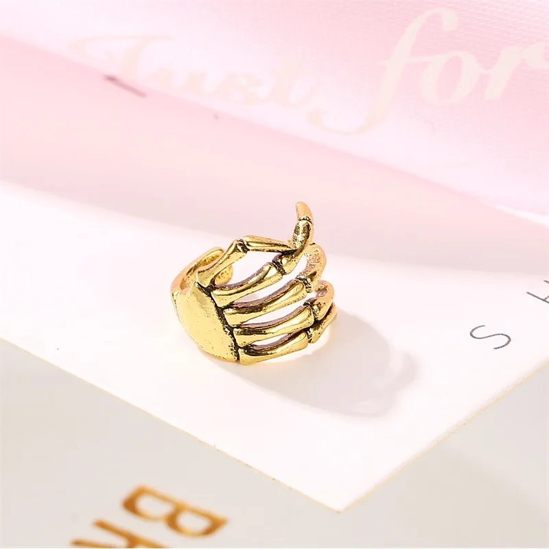 

Fashion Creative Punk Style Skull Finger Ear Bone Clip Earrings Women's Creative Non-Pierced Earrings Ear Clip Jewelry Wholesale
