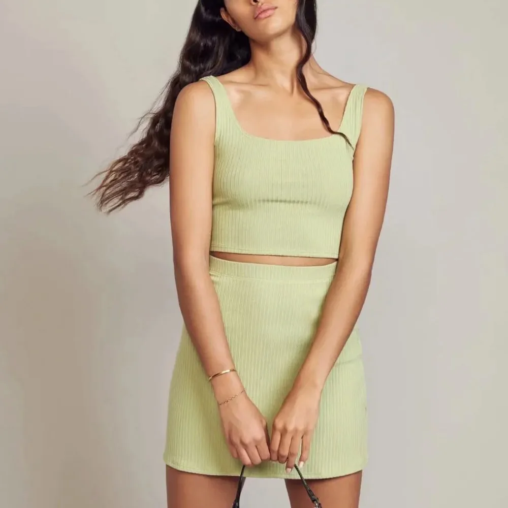 

2020 Summer Two Piece Set Women Fashion Sweet Sleeveless O Neck Crop Tops + Solid High Waist Bodycorn Skirts For Sexy Ladies