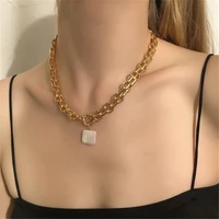 geometric square resin pendant for women with short collarbone chain around a gold neck chain necklace