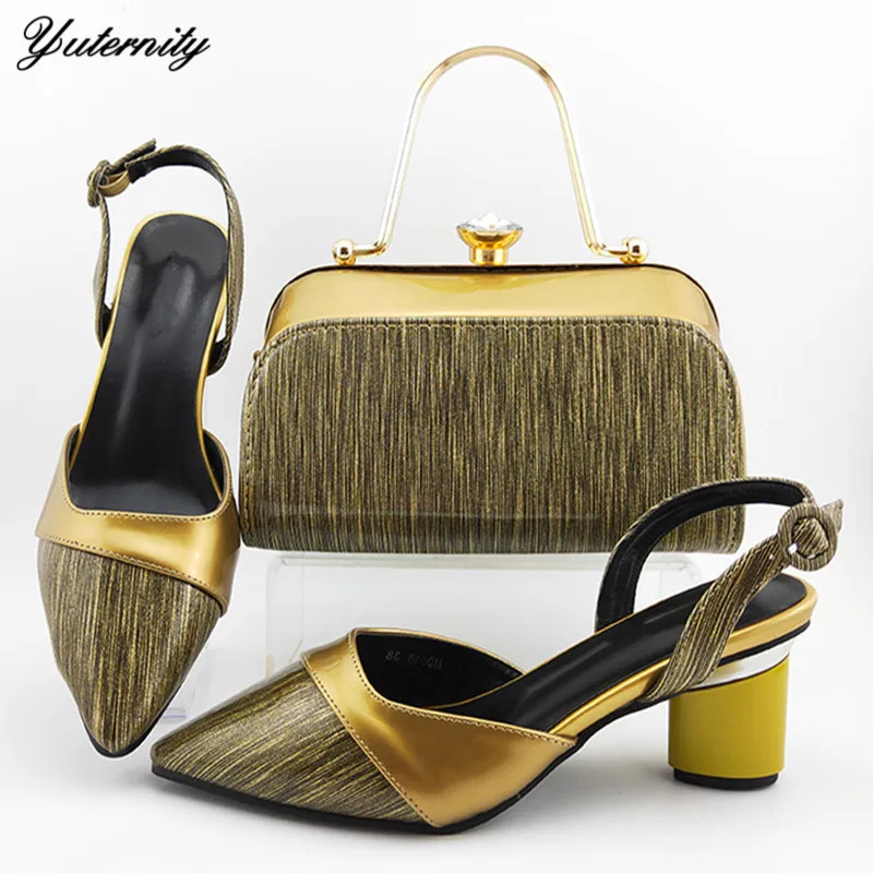 Комплект из вечерних туфель и сумочки в африканском стиле сезон весна осень