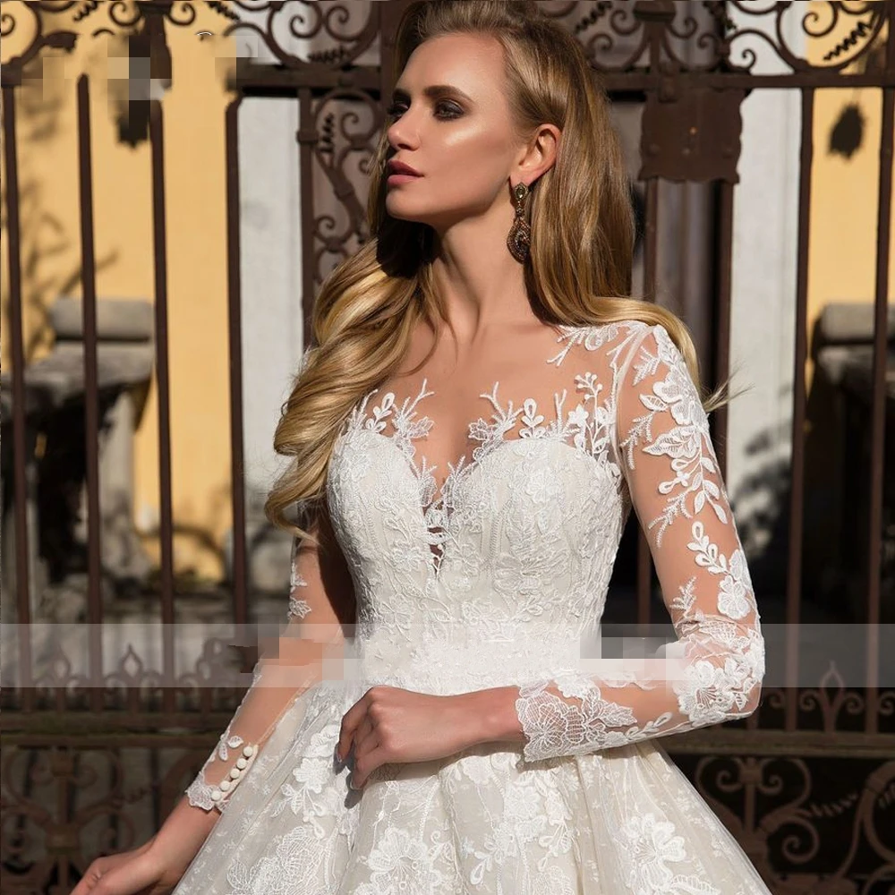 

Fashion Ball Gown Princess Wedding Dresses Illusive Long Sleeve Lace Appliqued Bridal Gowns