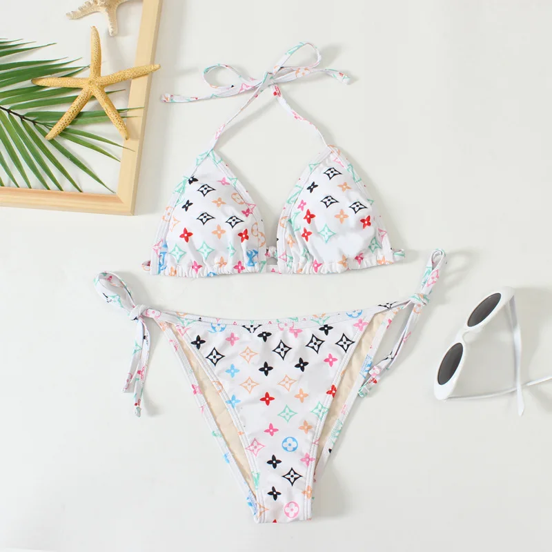 

2021 summer new split women's swimsuit European and American popular printing triangle bag sexy fashion swimsuit