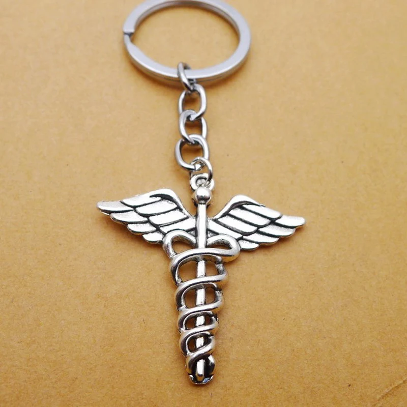 

2021 New 40*40mm Alloy Wings Snake Keychain Antique Silver Jewelry Car Waist Bag Gift Pendant