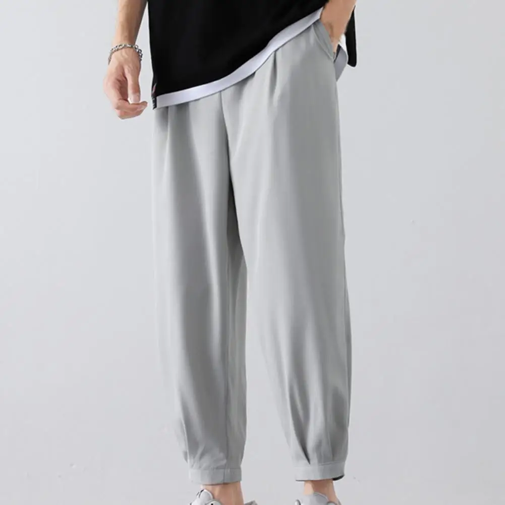 

Stylish Solid Color Men Pants Elastic Waist Ankle-length Smooth Wide Leg Ankle Tied Oversize Pants Sweatpants for Outdoor