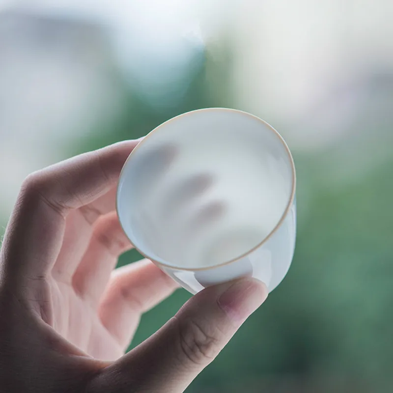 

Yongle Sweet White Kung Fu Tea Cup White Porcelain Tea Savoring Cup Transparent Master Cup Handmade Tea Set