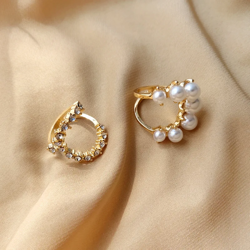 

Diamond inlaid temperament. Open ring women's fashion design sense Pearl index finger ring