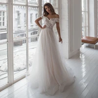 a line off the shoulder tulle wedding dresses 2021 sweetheart lace appliques button bridal gown for women backless sweep train