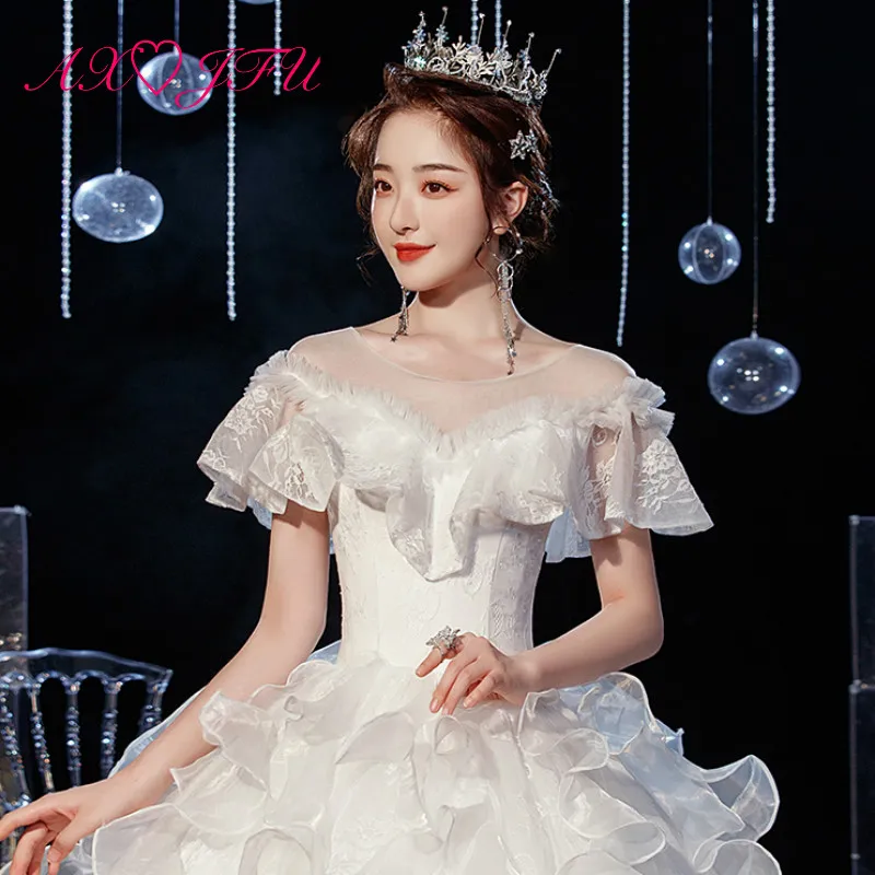 

AXJFU princess white lace bride wedding dress party vintage o neck ruffles sleeve beading crystal flower bride wedding dress