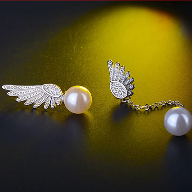 Женские серьги-гвоздики из серебра 925 пробы с двумя ангельскими крыльями |