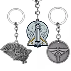 Брелок с героями игры брелок, цепочка для ключей The Last of Us Элли крылья Светлячок космическая ракета подвесной брелок ювелирные изделия в подарок