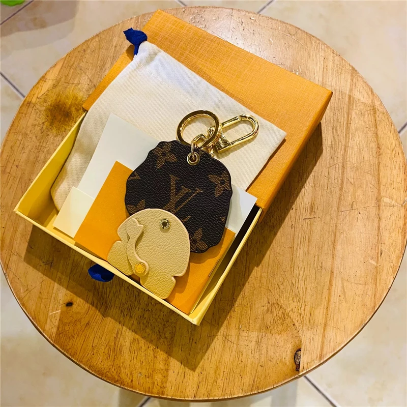 

2021 New High Quality Lion Keychain Acrylic Christmas Gift Keychains for Car Keys Ring Decoration Accessories