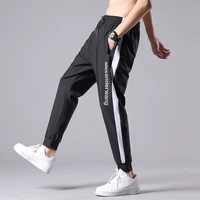 summer thin boys sports korean fashion loose casual pants mens ice fast drying 9 point pants youth student large trousers