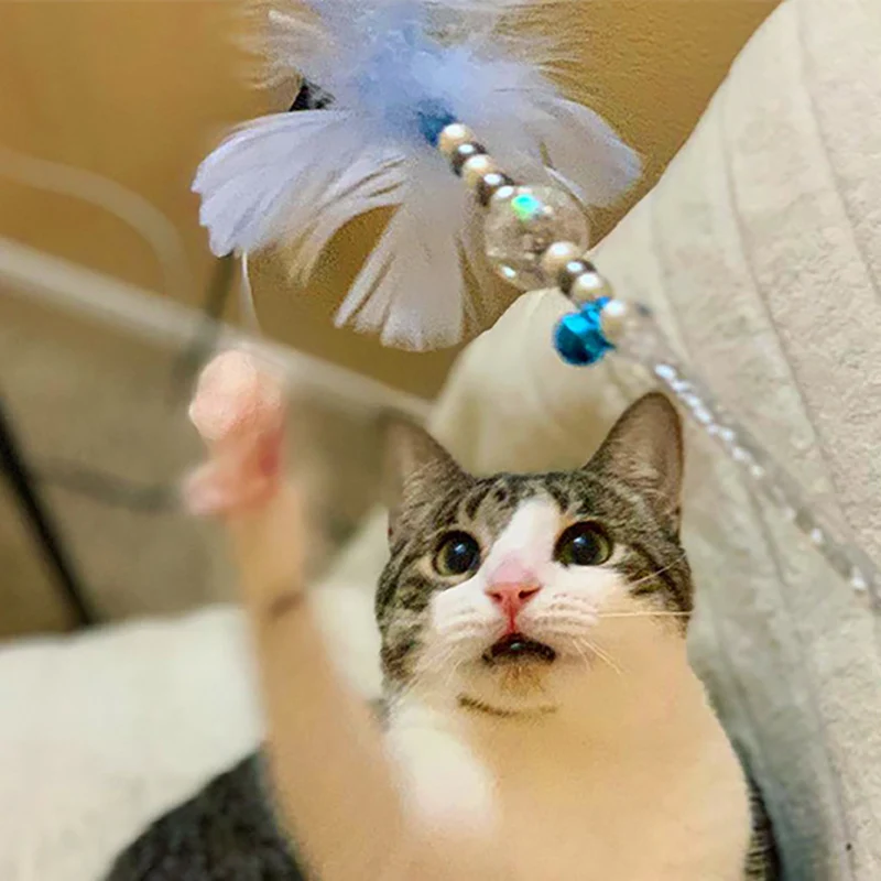 

Pet Interactive Cat Toy Catcher With Bells Feather Toys For Cats Pet Catching Game Cat Kitten Playing Stick Toy Cats Accessories