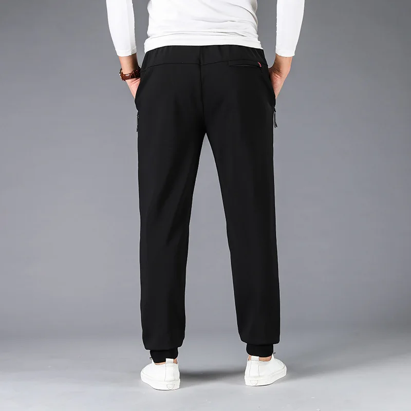 

Autumn and winter new men's young fat plus size knitted close up Plush sweatpants men's thickened pants