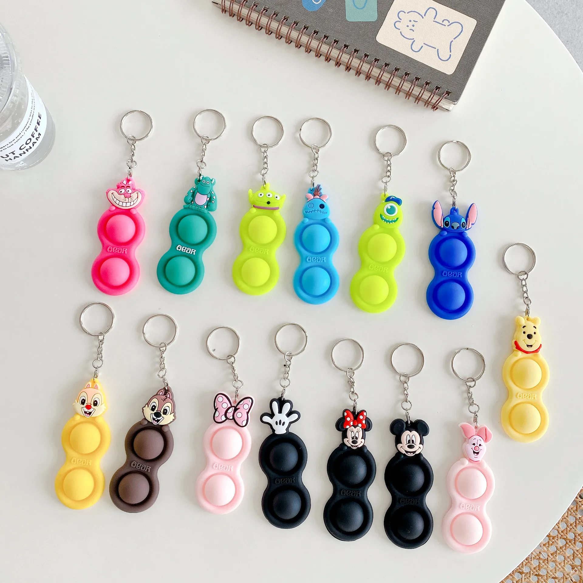 

Disney Mickey Minnie Fidget Toys pendant anime action figure Pooh keychain Reliver Stress cartoon toy Accessories birthday gifts