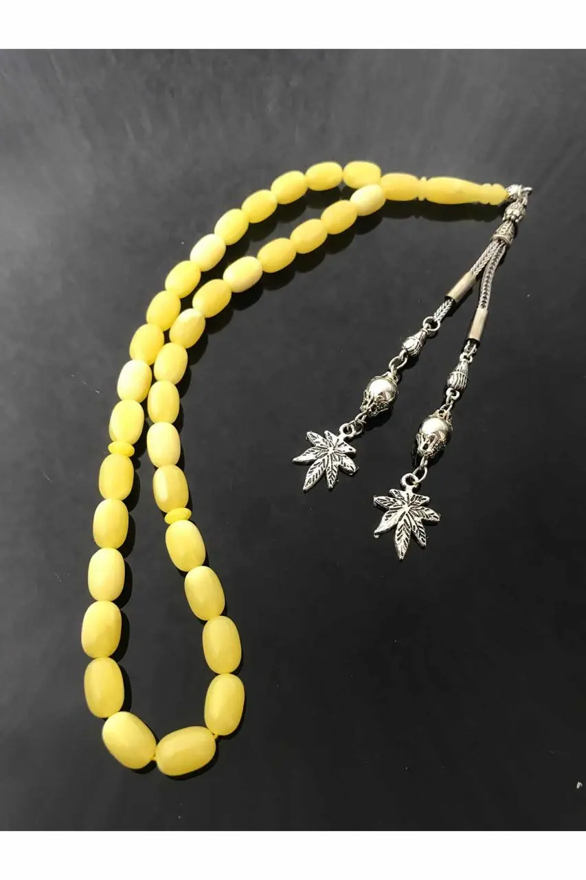 Серые желтые металлические кисточки с круглыми розами |