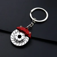 cute metal auto parts disc brake shock absorber keychain hub calipers key ring for car pendant key chain for men gift trinkets