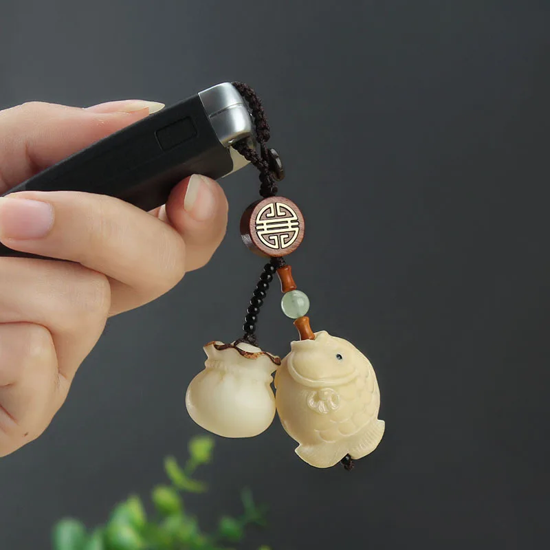 

Bodhi Purse Keychain Fish Ivory Fruit Car Key Pendant