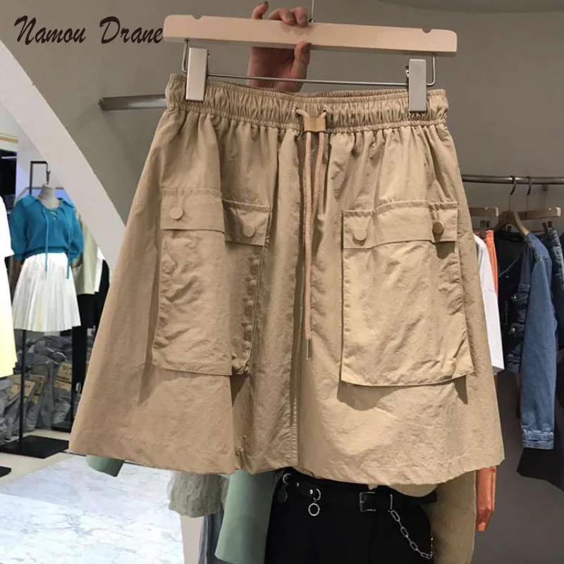 

Korean Pocket High Waist Skirt Female 2021 Design Sense Temperament All-match Solid Color Tooling Skirt Short Skirt Ins Tide