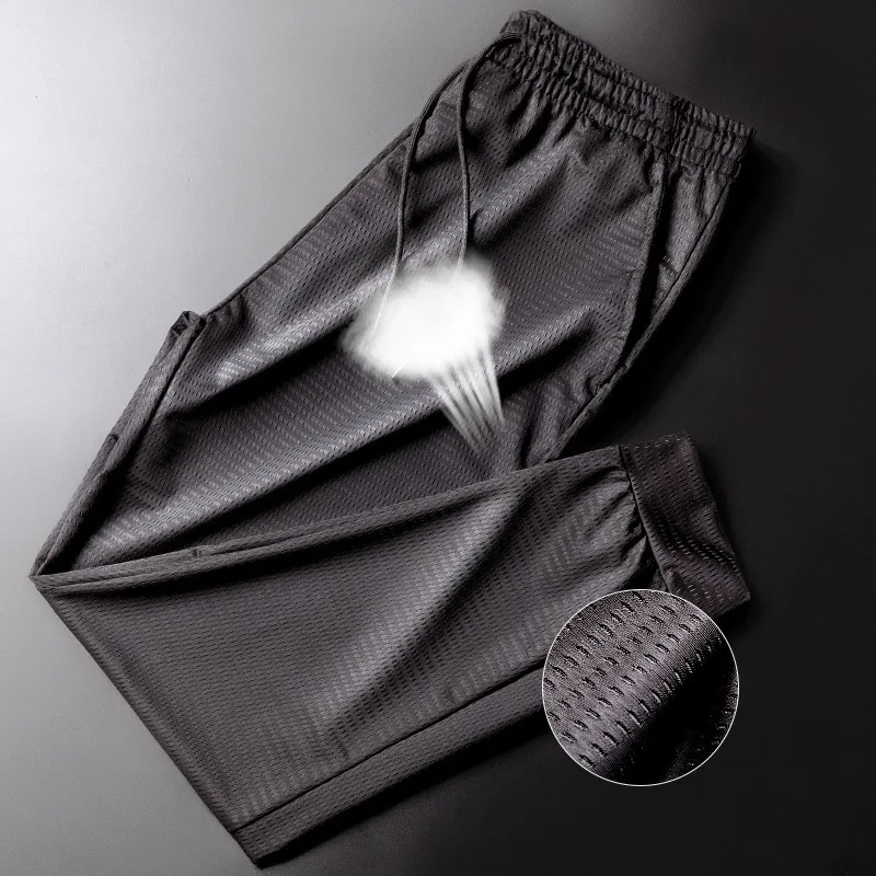

Summer Thin Ice Silk Pants Men's Loose Sports Pants Feet Stretch Nine-point Pants Quick-drying Breathable Air-conditioned Pants