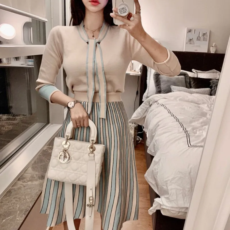 

Осенне-зимние комплекты из 2 предметов, элегантный пуловер с бантом на шнуровке и длинным рукавом, вязаный свитер + Полосатая юбка миди с выс...