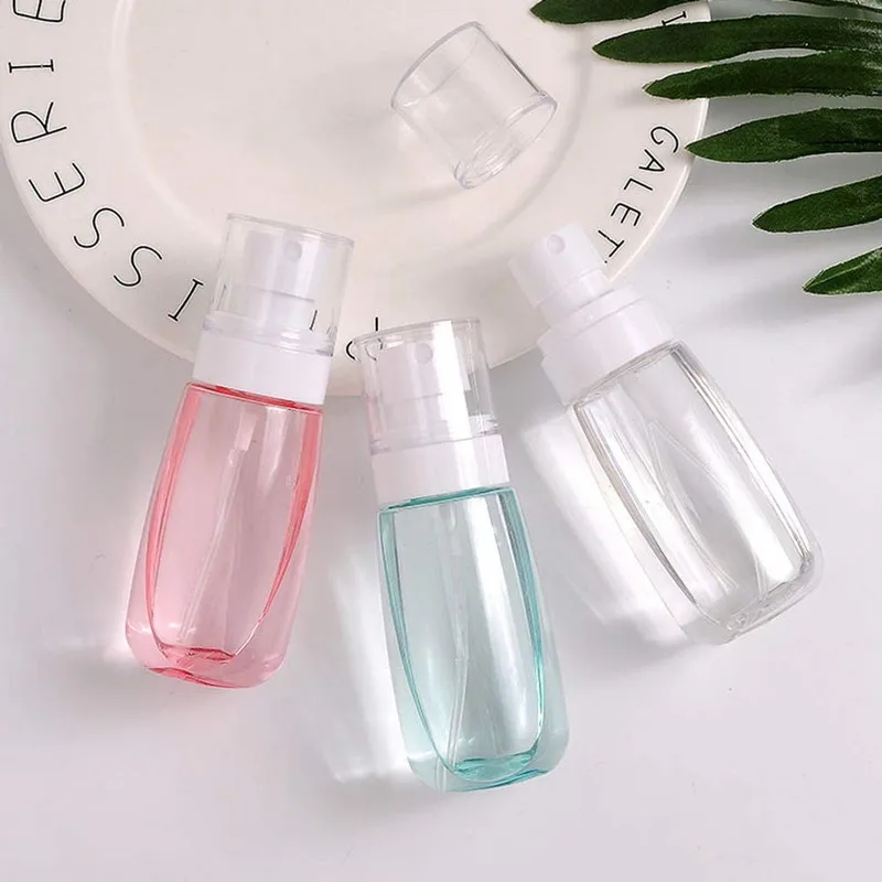 

10PCS of 60ML Round Plastic Spray Bottle with Lid Hot Sale Cosmetic Sample Bottles Refillable Packing Container
