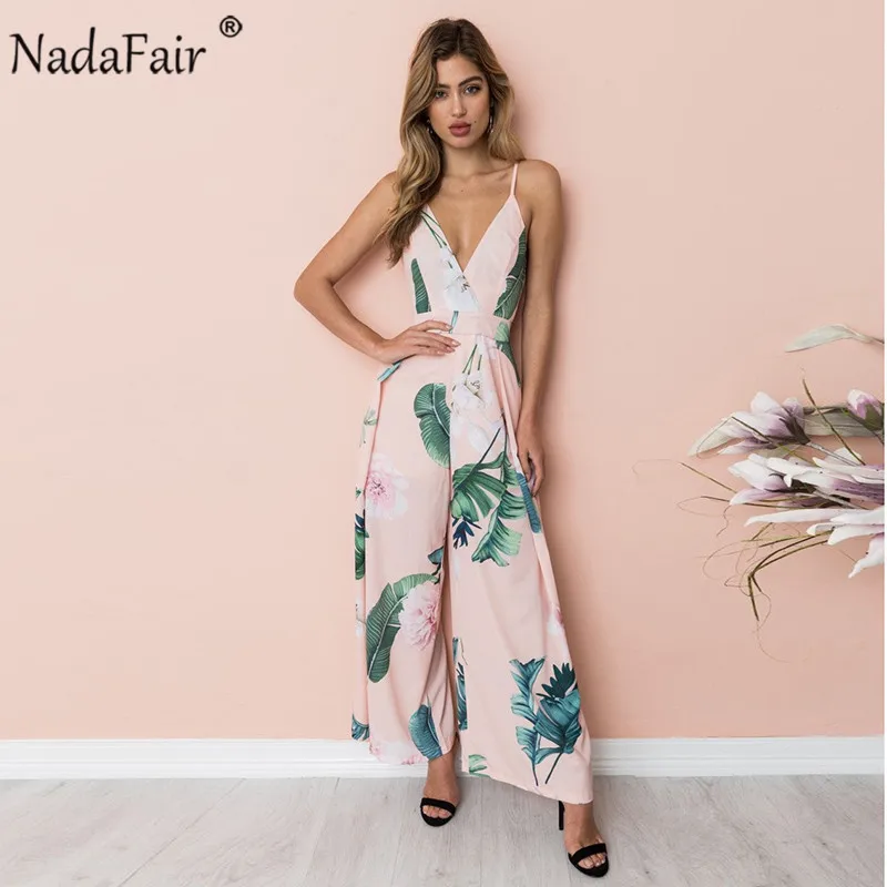 Nadafair Boho Цветочные Комбинезоны для женщин V образным вырезом спинки Лук ремень Летний Пляжный комбинезон длинные брюки