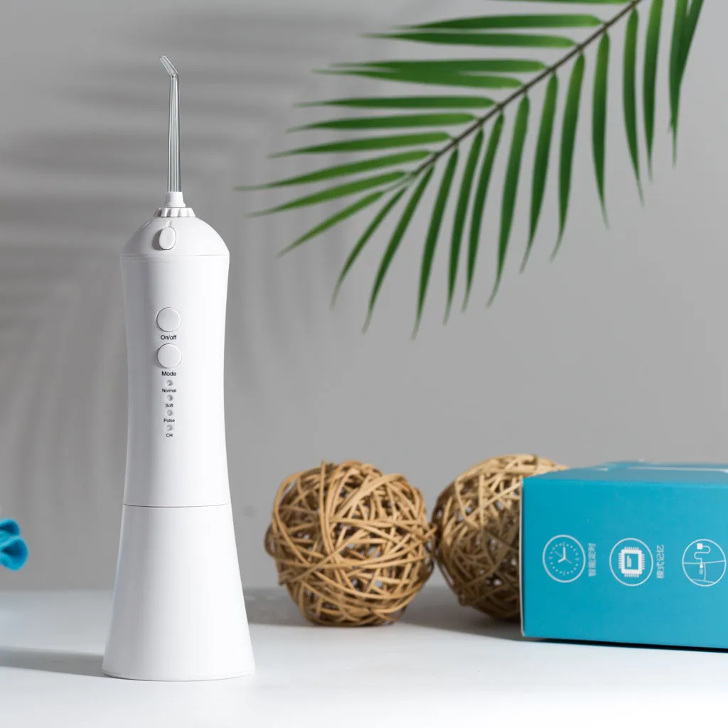 Электрическая машинка для чистки зубов с красными зубьями портативная машина