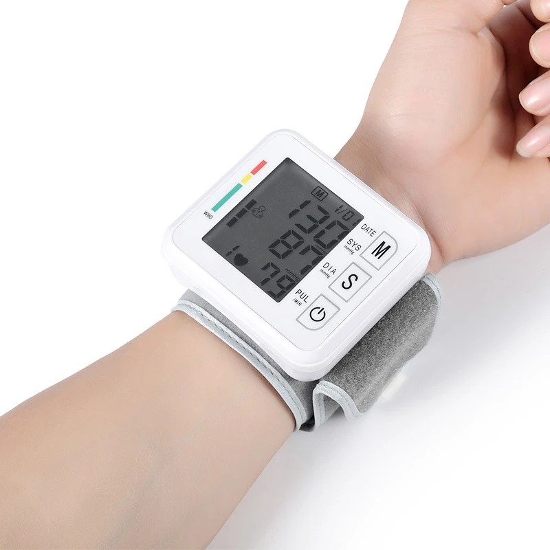 

Wrist Sphygmomanometer Large screen digital display fast measurement Voice read Blood pressure heart rate monitor Home elderly