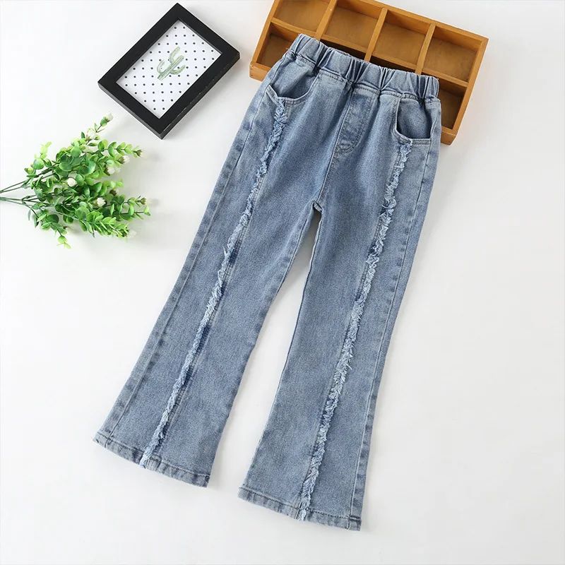 

Новинка осени 2021, детские джинсы, модные корейские однотонные джинсовые брюки для девочек с вырезами, Детские повседневные расклешенные бр...