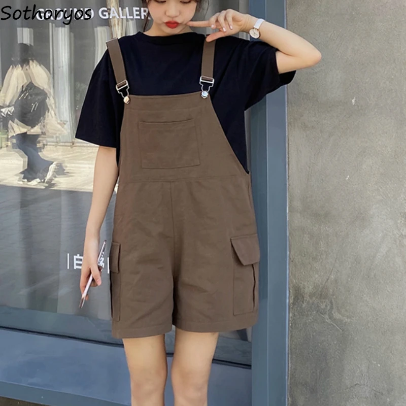 Комбинезон женский однотонный с широкими штанинами карманами |