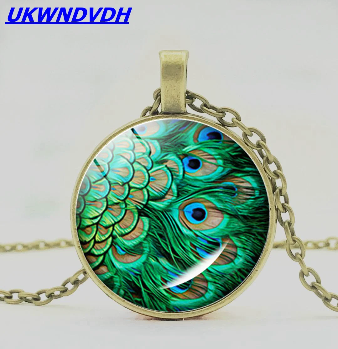 Красивое ожерелье с павлиньим пером модное со стеклянной подвеской в стиле панк