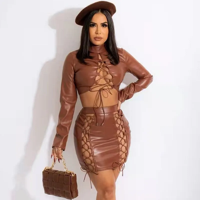

Sexy PU Leather 2 Piece Club Outfits for Women Dress Sets Long Sleeve Crop Top Bandage Mini Skirt Suit Night Party Matching Sets