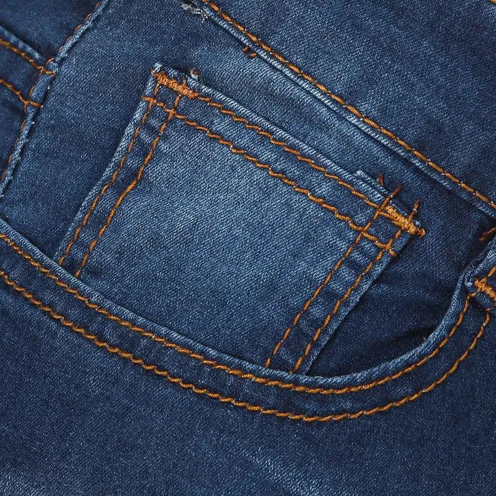 Мужские джинсы на молнии классические с потертостями повседневные обтягивающие