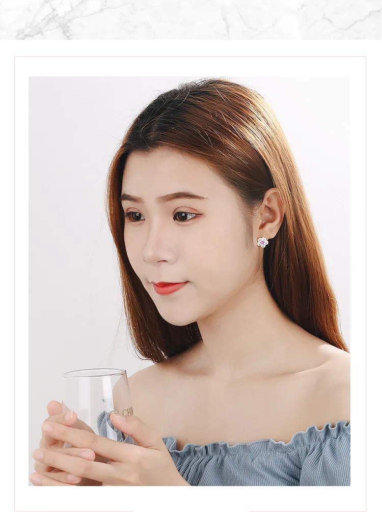 Женские серьги-гвоздики серебряного цвета с фиолетовым/розовым фианитом |