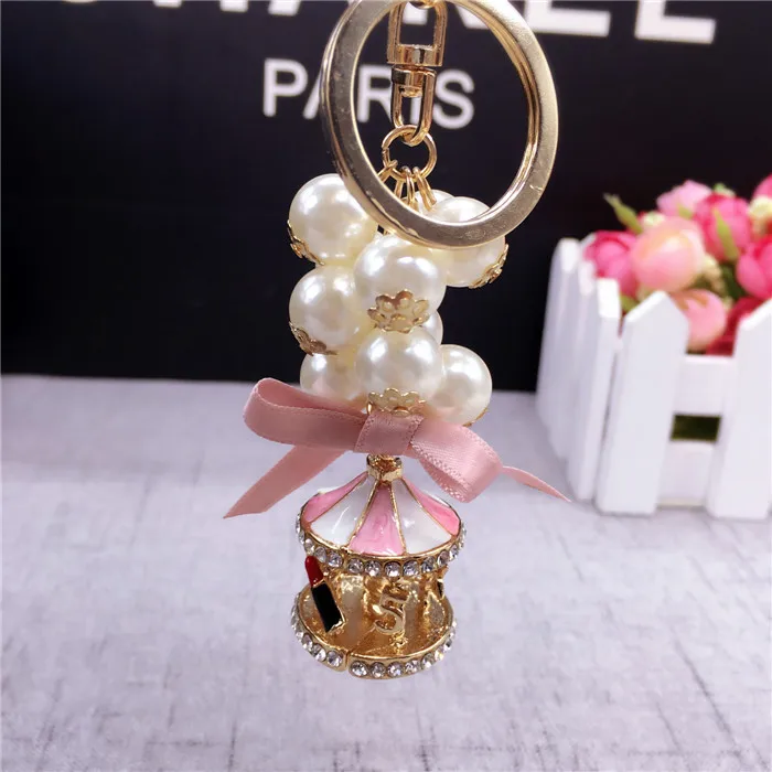 New Creative Fashion Carousel Key Chain Personality Trend Pearl Charm Key Chain Lady Cute Bag Mobile Phone Pendant Key Chain