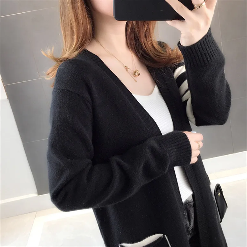 Женский трикотажный свитер средней длины кардиган с большими карманами и