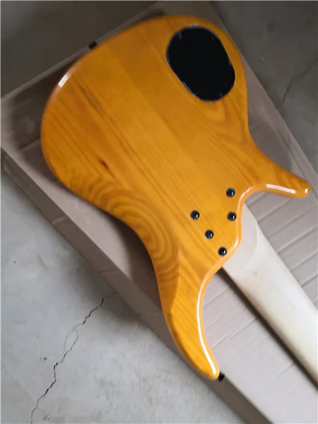 

Custom without fret Solid natural ash transparent yellow body 7 string electric bass guitar in stock 62