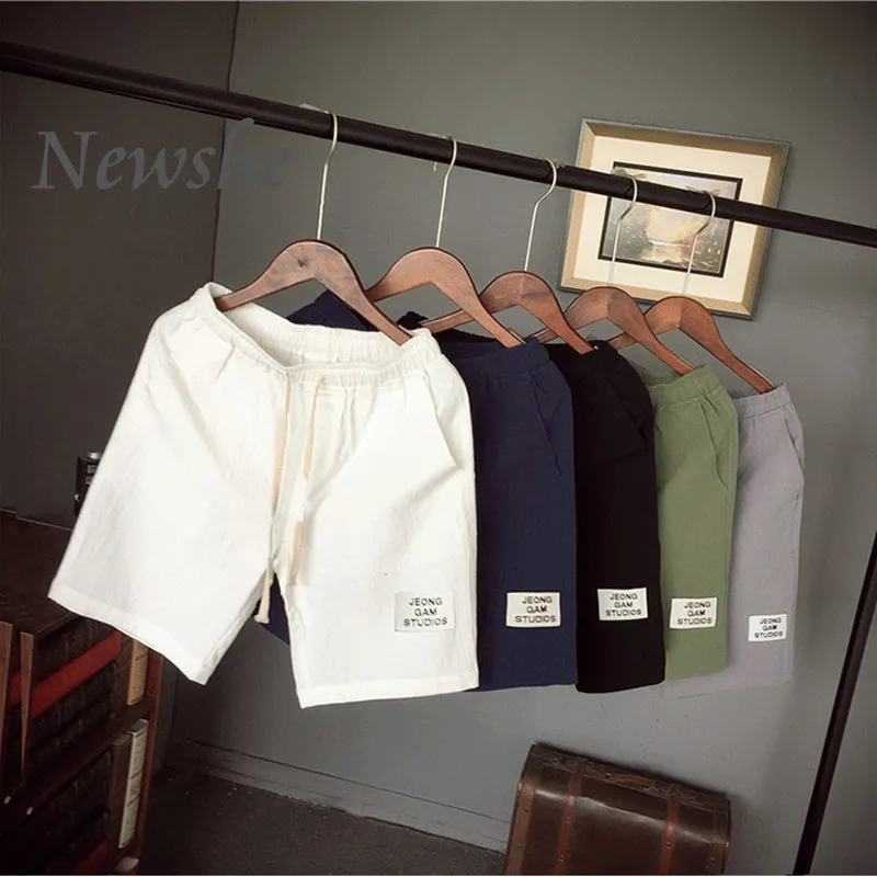 

2021 Men's Summer Loose Drawstring Shorts Casual Black White Board Shorts Swimming Pants Clothing New Beach Sweatpants Loose