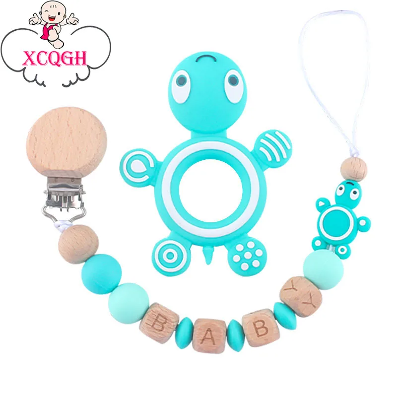 

XCQGH индивидуальный 2 шт./компл. силиконовый детский Прорезыватель для зубов в виде черепахи и буковая деревянная детская соска-пустышка лучш...