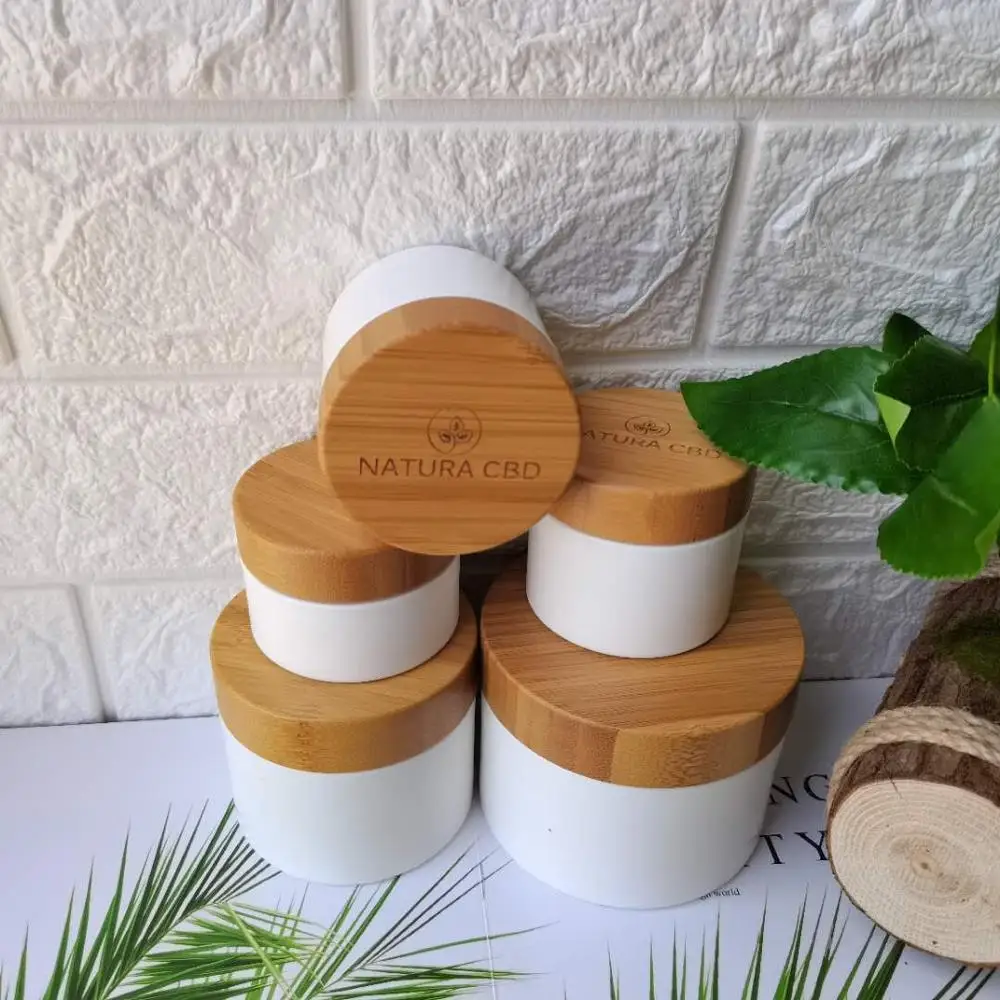 

cosmetic containers cream jar10g 30g 50g 100g 150g White PP Plastic Jar with Bamboo Lid CBD Hemp Cream wood containers