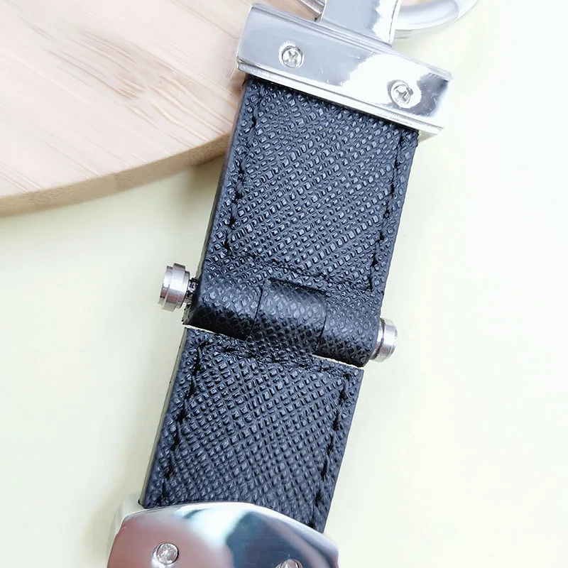 

Leather Key chain for Men and Women Jewelry Stainless Steel Metal Keychain