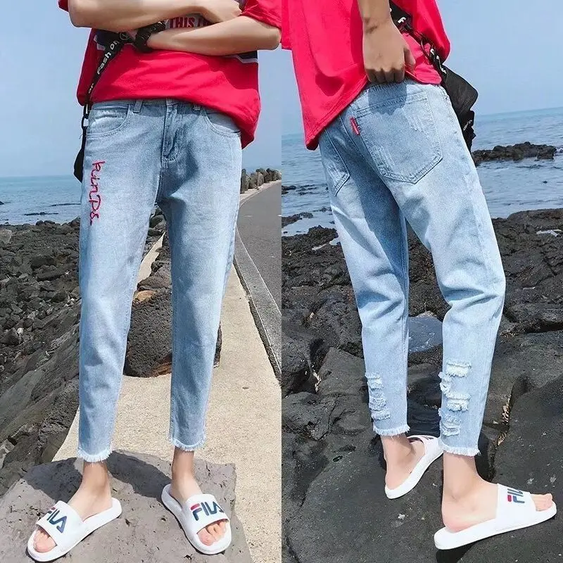 

Summer thin Korean fashion spring beggars pants loose hole jeans men's Capris light color slim feet