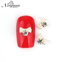 nziquan 10 piecespack bow pearl rhinestone decoration nail art decoration 3d metal nail jewelry vintage manicure charm