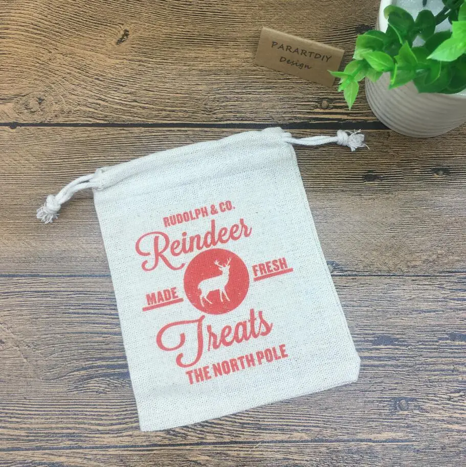 Подарочные сумки в подарок на Рождество с изображением северного оленя