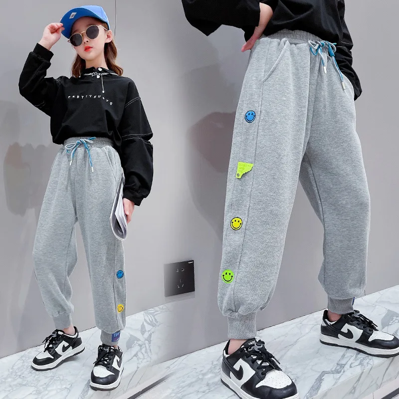 

Girls Casual Pants Spring And Autumn Pure Cotton Girls Trousers Cartoon Smiley Fashion Sports Pants Elastic Waist Pants 10-14 Y