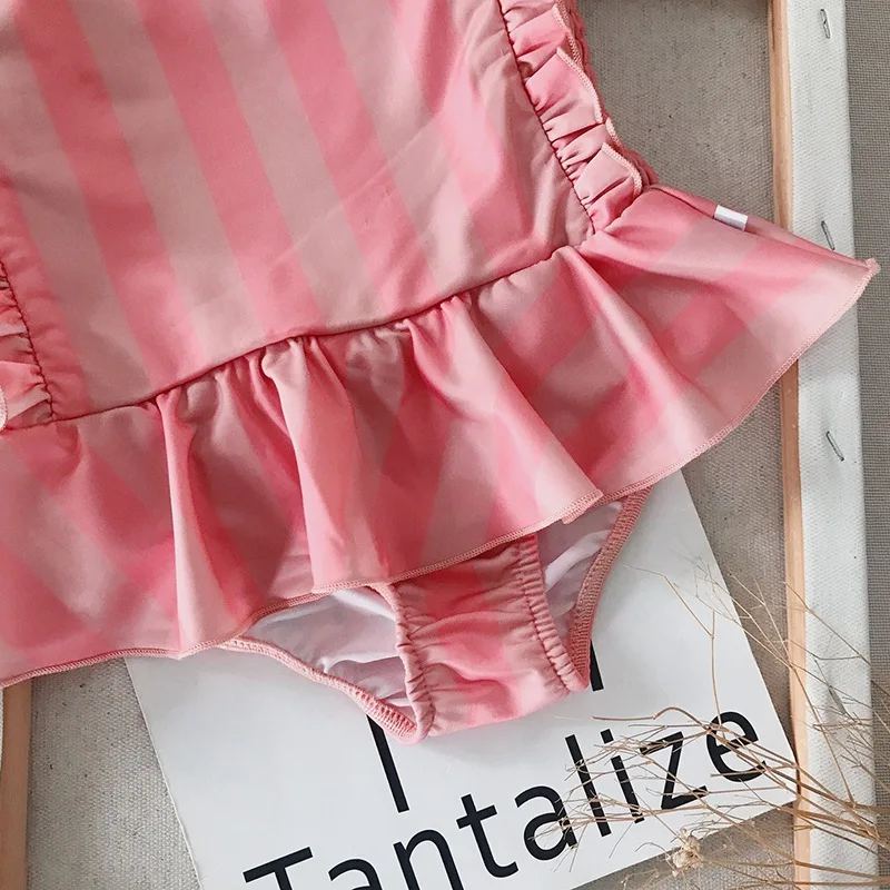 

Hot Sale Girls Swimsuit Female Baby Cute INS One-piece Pink Striped Lace suit Send Swimming Cap Ladies Summer New