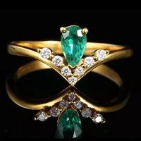milan girl inlaid emerald crystal ring color treasure ring female new fashion temperament niche design ring to attend the banque