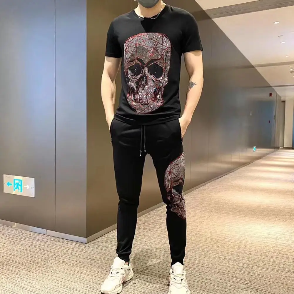 

High quality unique rhinestone big skull head pattern Men's Tracksuit slim T-shirt + casual pants male designer brand super suit