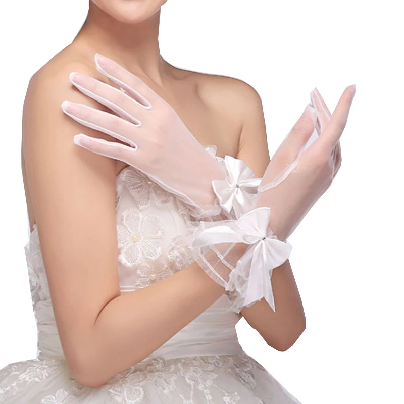 

Bridal Gloves White Wrist Bow Glove Lace Mesh See Through Wedding Etiquette Gloves Large Bowknot Transparent Net Yarn Mesh Glove